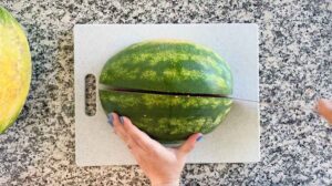 Quartering a watermelon.