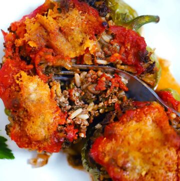 Square photo of a Greek stuffed pepper with ground