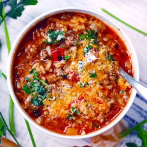 Square photo of a bowl of stuffed pepper soup.